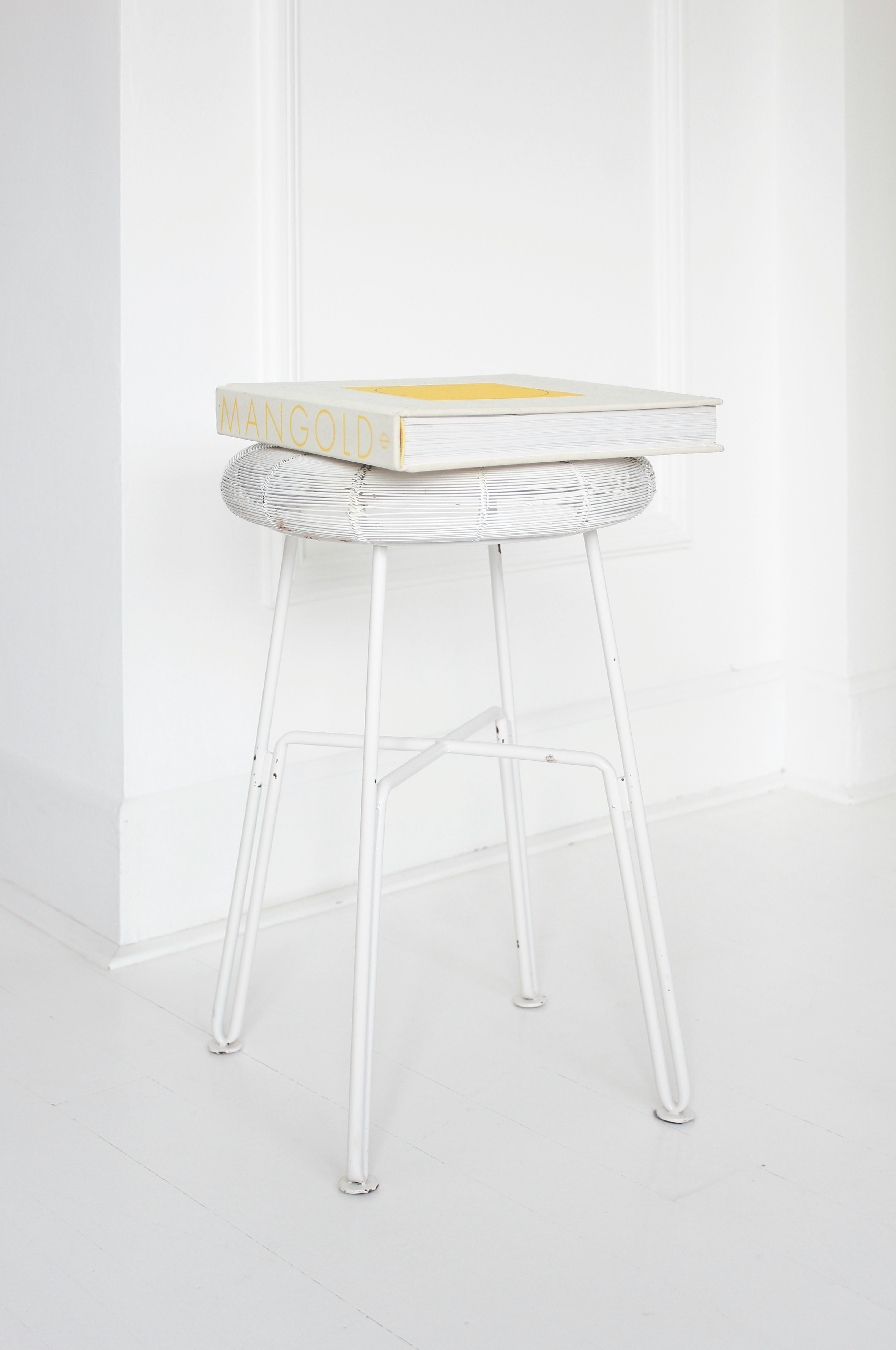 Mangold box on white stool